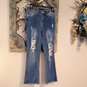 Forever 21 Classic Blue Boot Cut  Ripped Jeans. Excellent condition NWOT Size 27